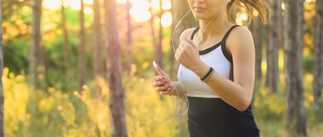 woman running in the woods