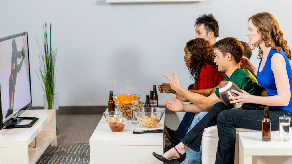 family watching the superbowl on tv