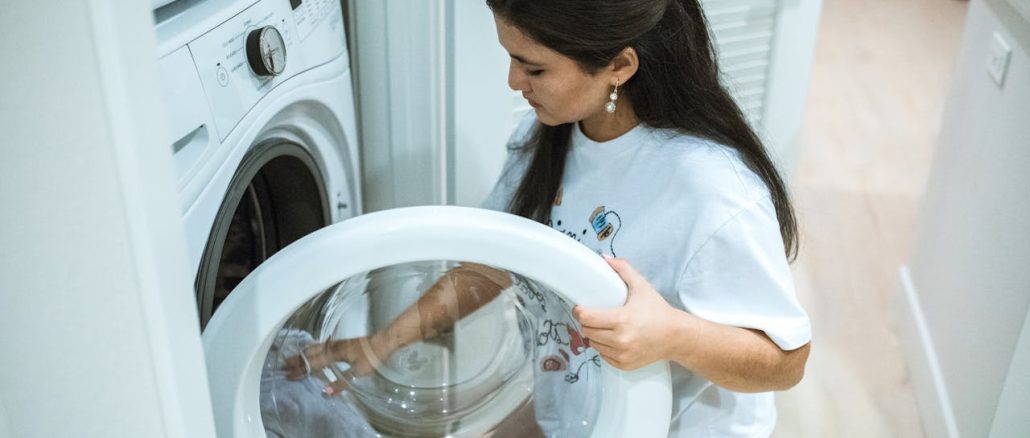 woman opening her dryer