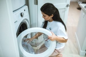 woman opening her dryer