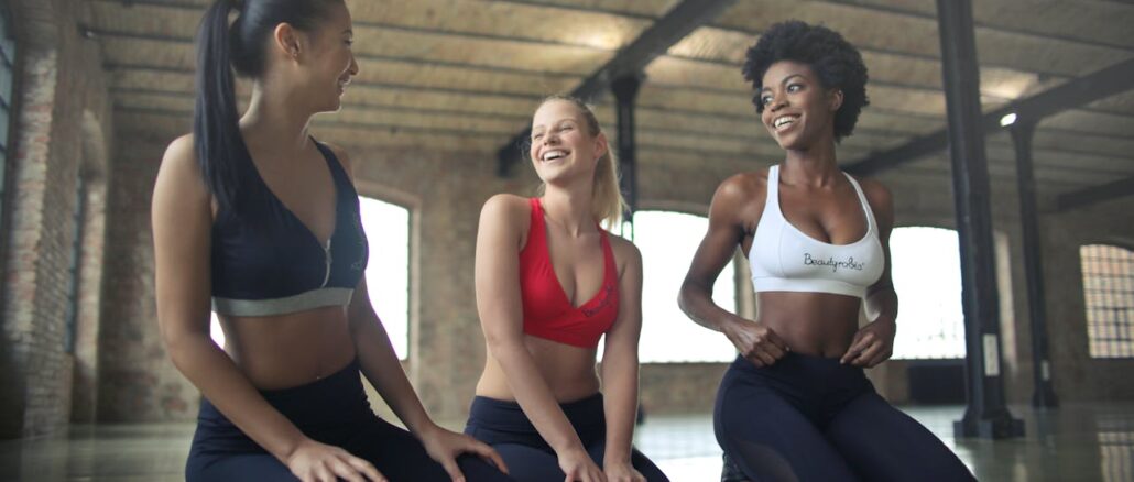 three-women-kneeling-on-floor-