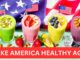 Four colorful smoothies (avocado almond, strawberry walnut, mango pistachio, blueberry cashew) with fresh toppings, set against a waving American flag, promoting health and wellness by Pump It Up Magazine.