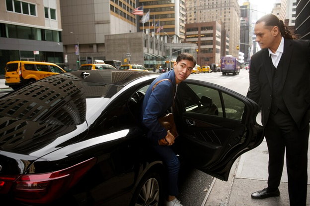 a man getting out of a car