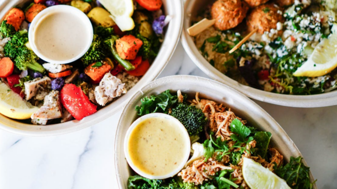 bowls of food on a marble surface