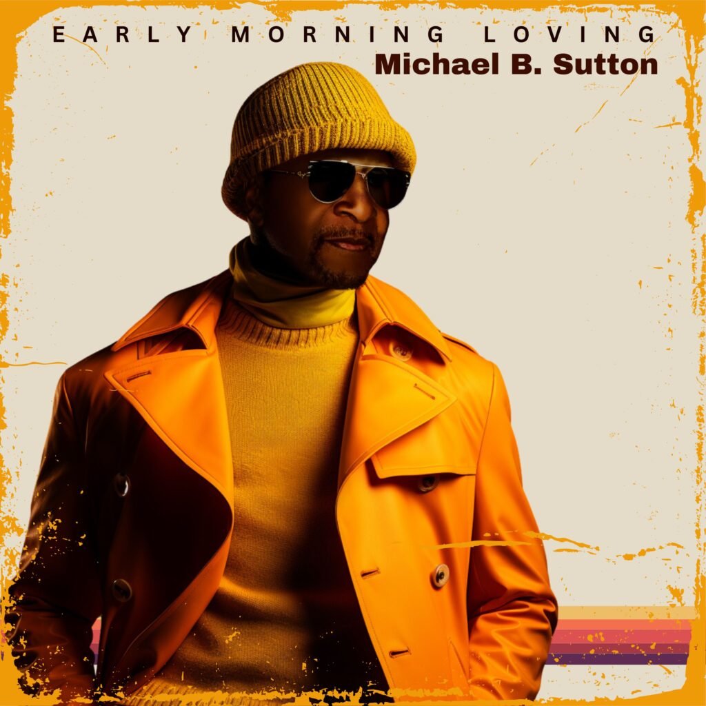 FUNK MAESTRO Michael B. Sutton on the cover of his single 'Early Morning Loving,' wearing a vibrant orange trench coat and knit beanie, exuding a stylish and soulful vibe.