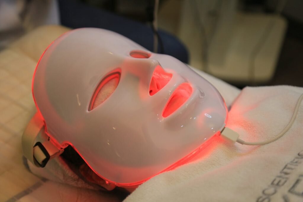 LED face mask used in celebrity skincare secrets for glowing skin in 2025