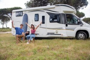 couple-sitting-outside-the-rv-7967373