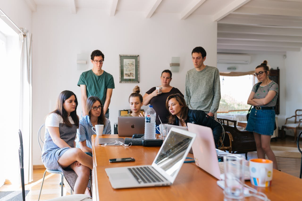 group-of-people-watching-on-laptop-